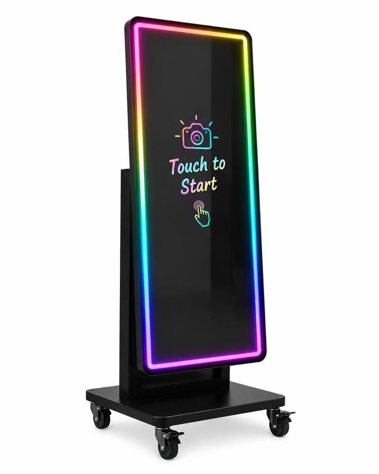Tall black full-length touch-screen mirror booth with rainbow LED border on a wheeled stand